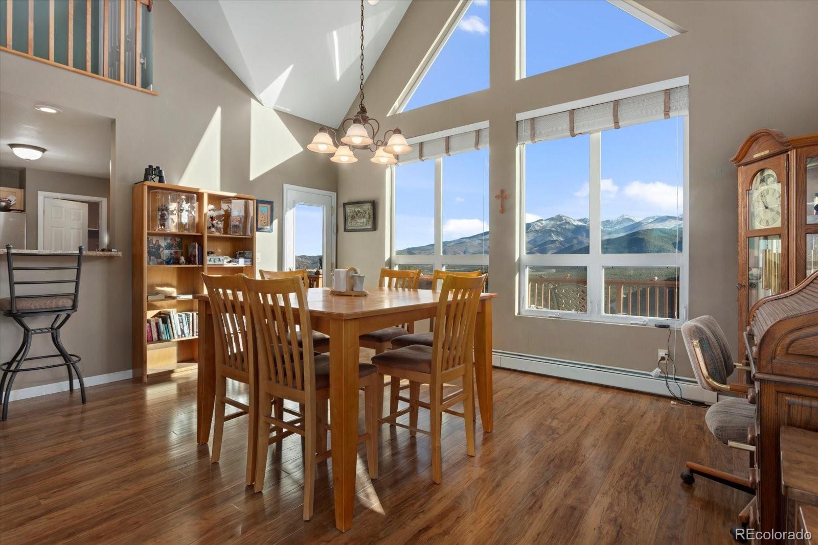 402 Trailridge Road Coaldale, CO 81222 - Photo 6 of 50 a view of a dining room with furniture window and wooden floor