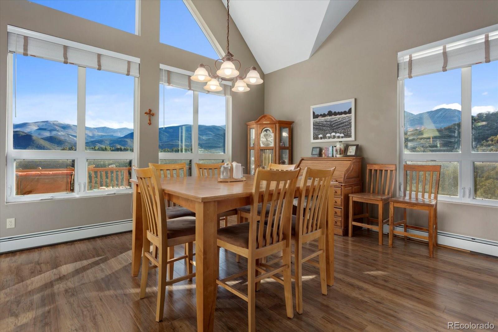 402 Trailridge Road Coaldale, CO 81222 - Photo 7 of 50 a view of a dining room with furniture window and wooden floor