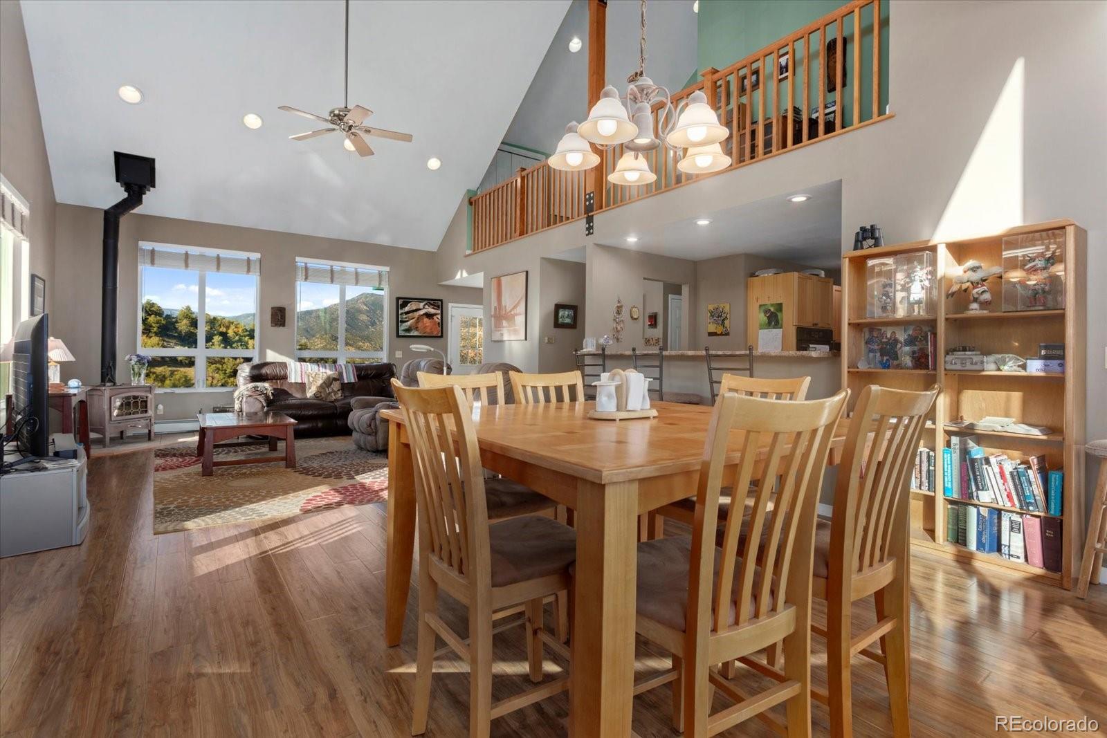 402 Trailridge Road Coaldale, CO 81222 - Photo 9 of 50 a view of a dining area with furniture and wooden floor
