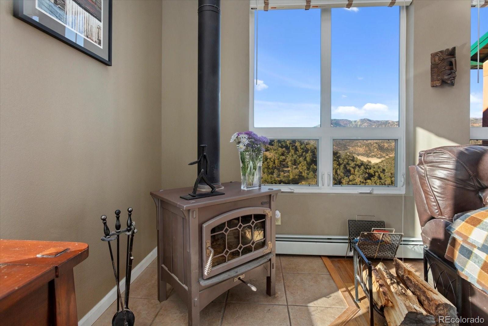 402 Trailridge Road Coaldale, CO 81222 - Photo 10 of 50 a living room with furniture and a window