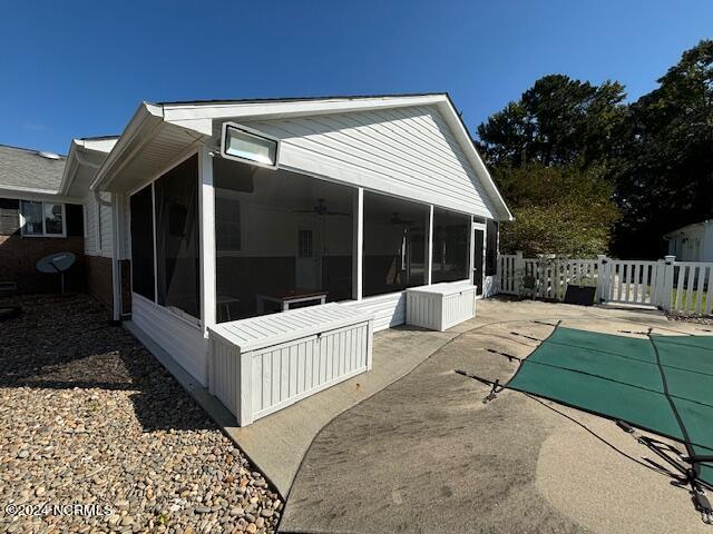 973 Forlines Road Winterville, NC 28590 - Photo 41 of 71 View of the Sunroom w/Access from Salt Water Pool & Brick Floored Great Room