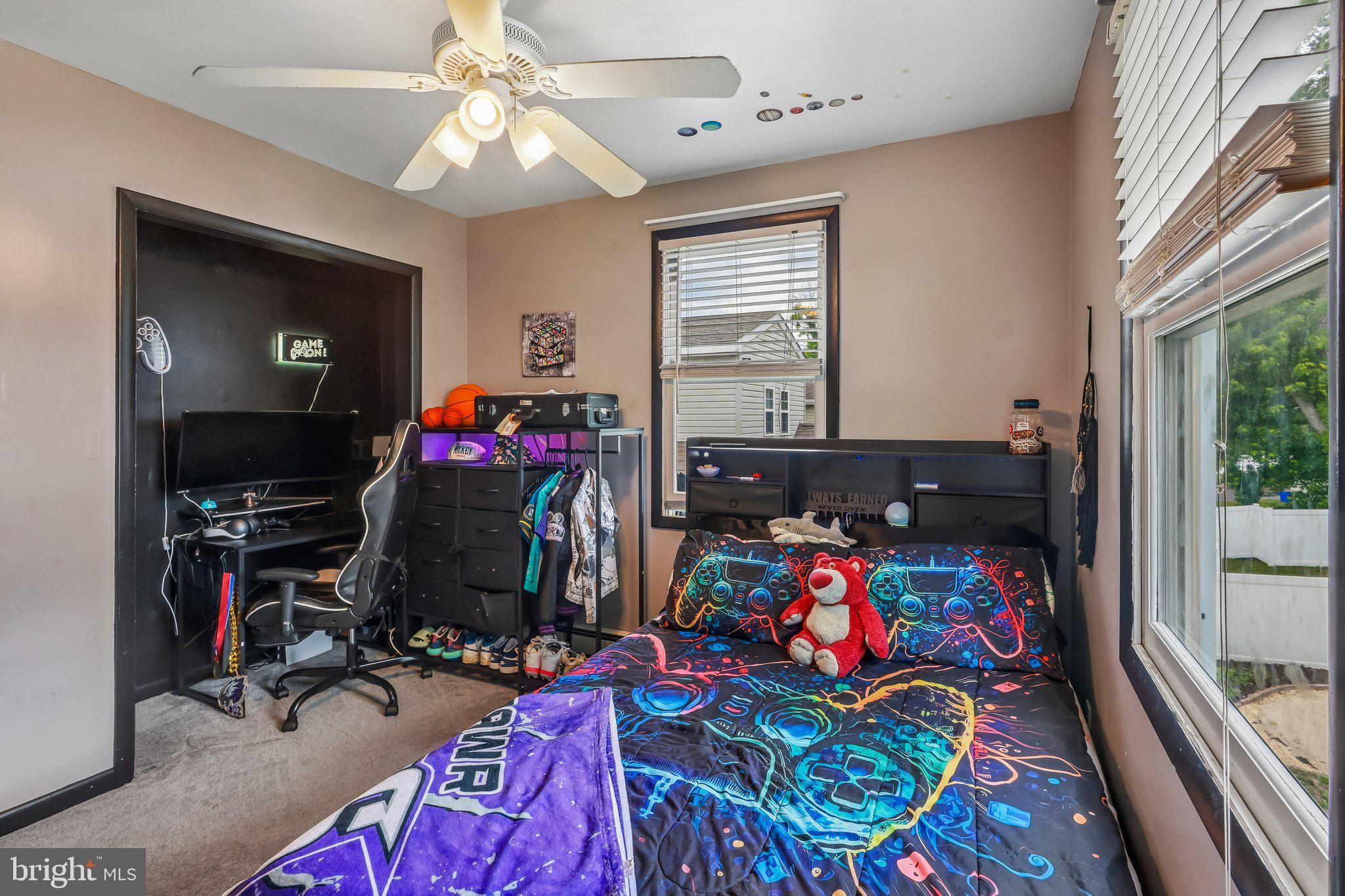 878 Crescent Avenue Runnemede, NJ 08078 - Photo 15 of 24 a bedroom with furniture and a flat screen tv