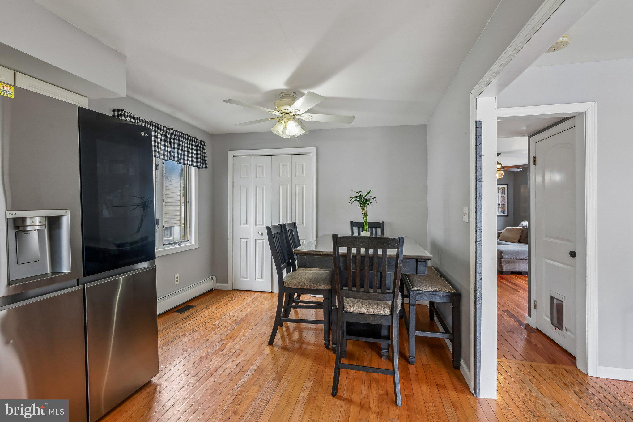 878 Crescent Avenue Runnemede, NJ 08078 - Photo 6 of 24 a view of a dining room with furniture and wooden floor