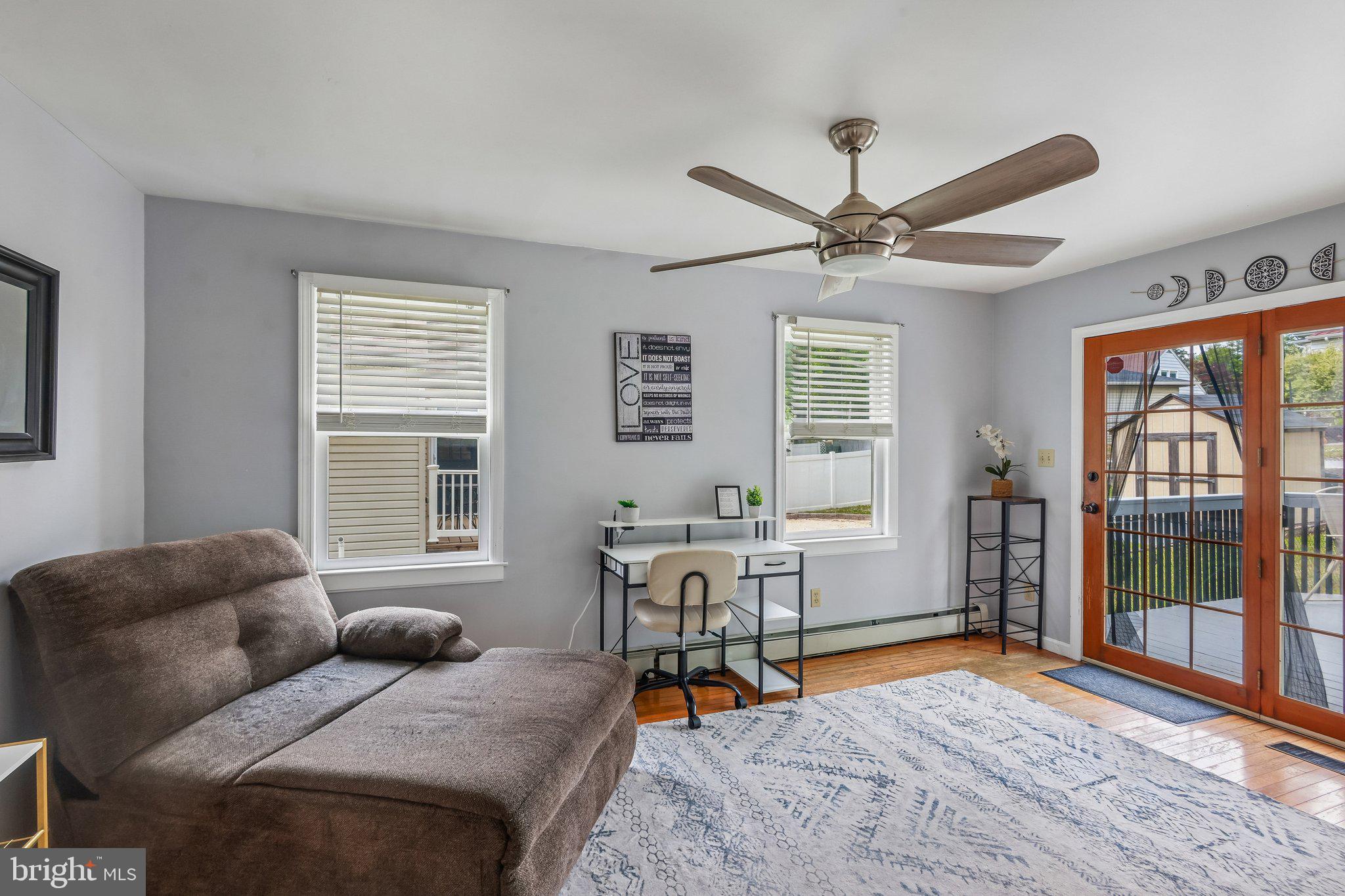 878 Crescent Avenue Runnemede, NJ 08078 - Photo 8 of 24 a living room with furniture and a window