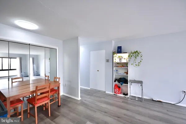 a view of a living room and dining room