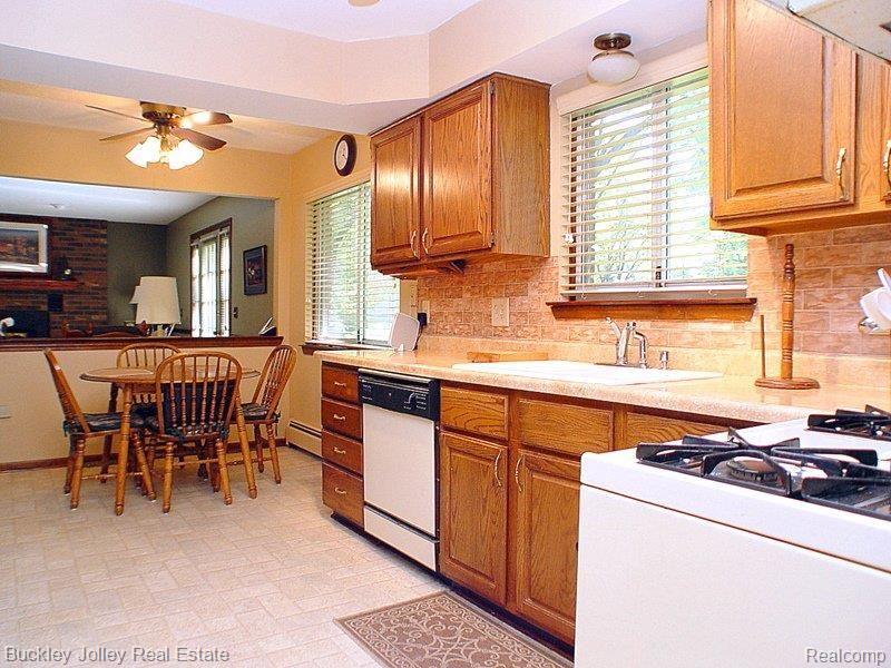 10682 Culver Road Brighton, MI 48114 - Photo 8 of 19 Dining Area Overlooks the Kitche