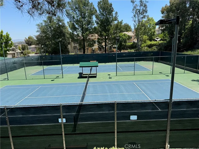 a small pool is sitting in the middle of a yard