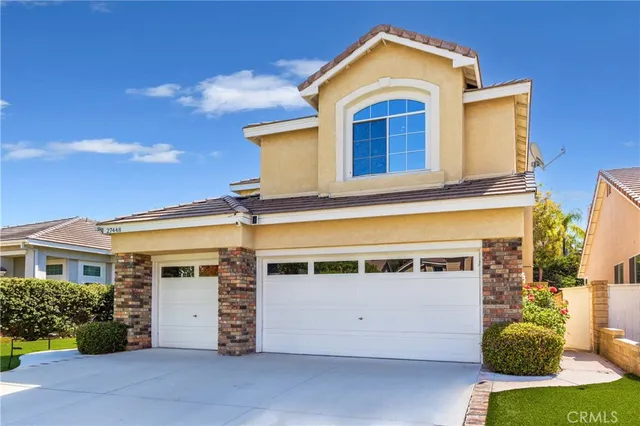 a view of a house with a garage