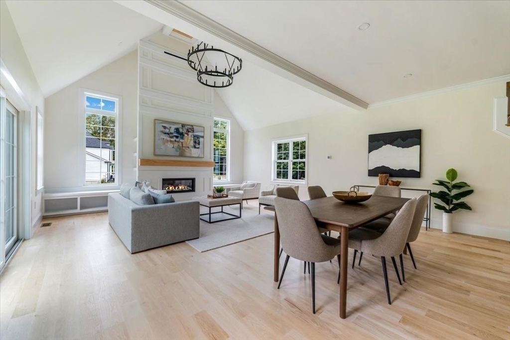 103 Center Street Hanover, MA 02339 - Photo 14 of 42 a view of a dining room with furniture window and wooden floor