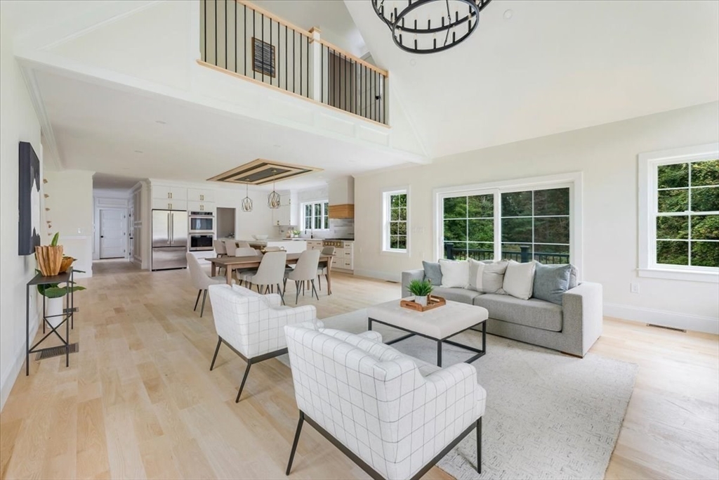 103 Center Street Hanover, MA 02339 - Photo 15 of 42 a living room with furniture and a large window