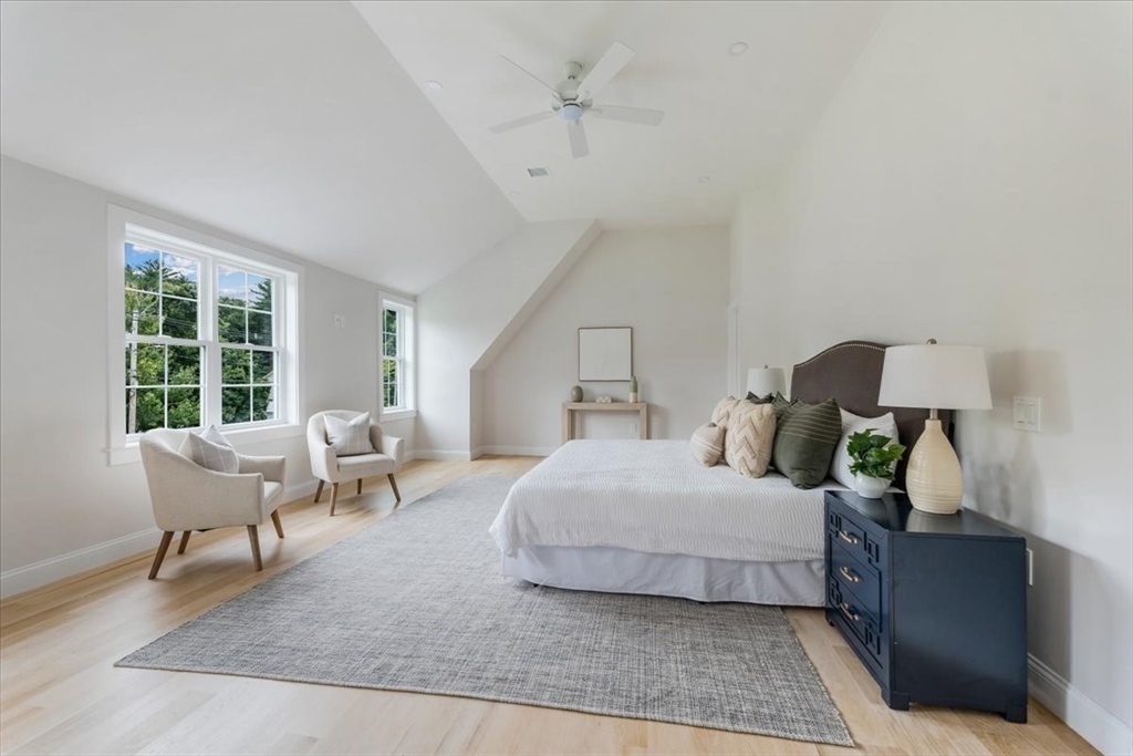 103 Center Street Hanover, MA 02339 - Photo 18 of 42 a bedroom with a bed and wooden floor