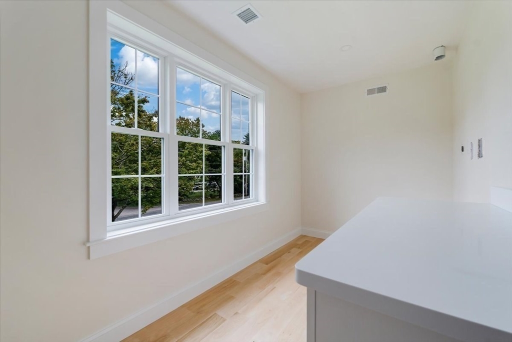 103 Center Street Hanover, MA 02339 - Photo 21 of 42 a view of an empty room with a window