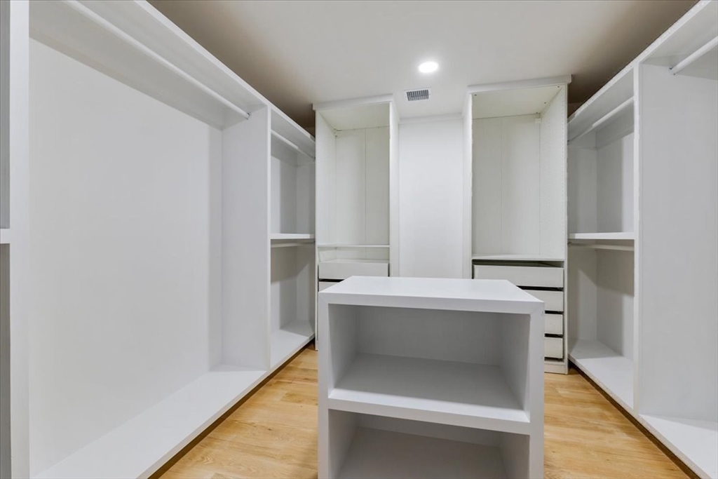 103 Center Street Hanover, MA 02339 - Photo 22 of 42 a view of cabinets with wooden floor