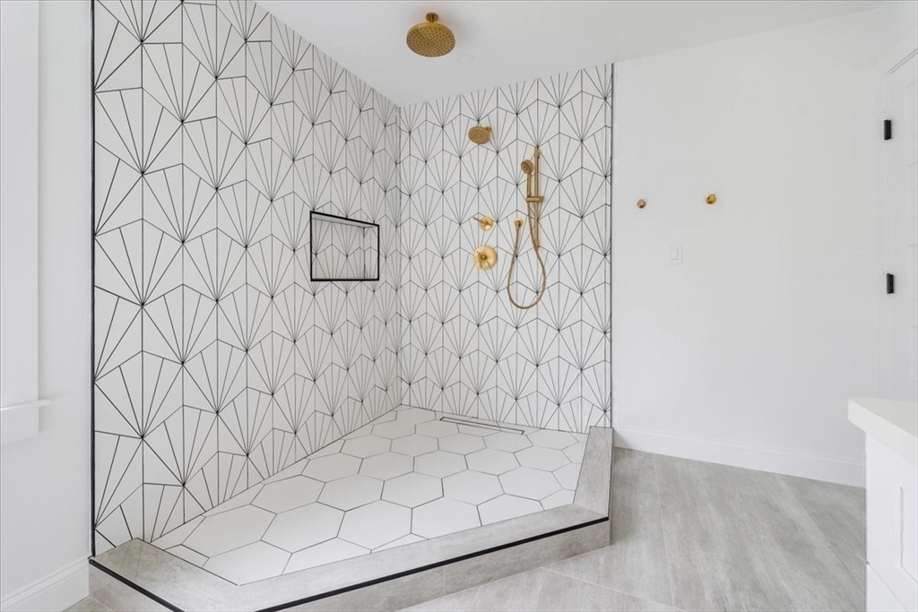 103 Center Street Hanover, MA 02339 - Photo 25 of 42 a bathroom with a white shower