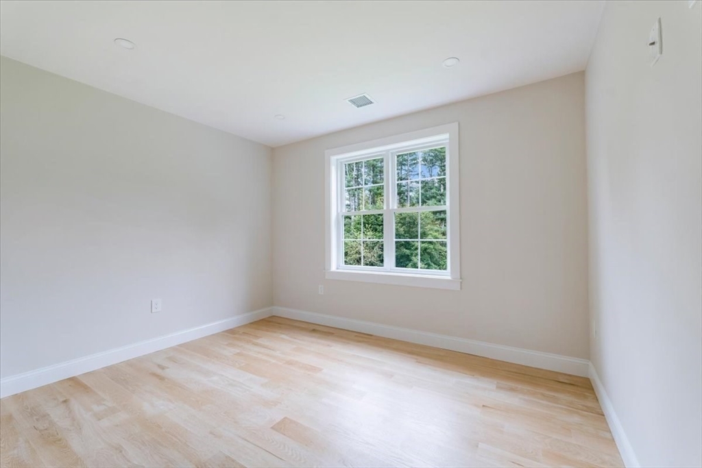 103 Center Street Hanover, MA 02339 - Photo 29 of 42 an empty room with a window