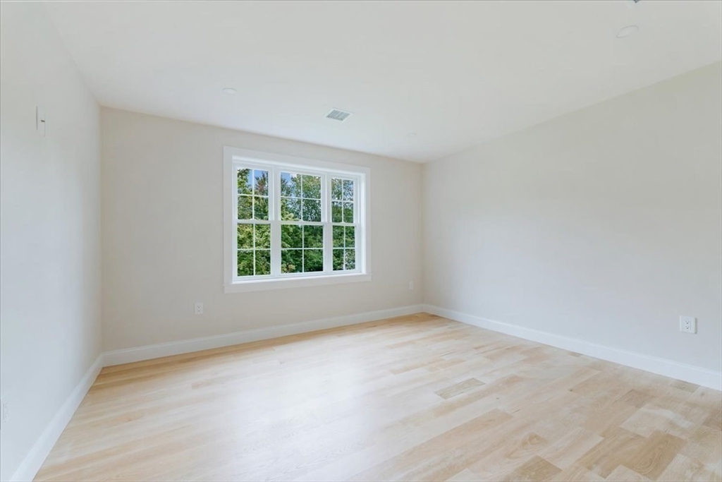 103 Center Street Hanover, MA 02339 - Photo 31 of 42 an empty room with a window
