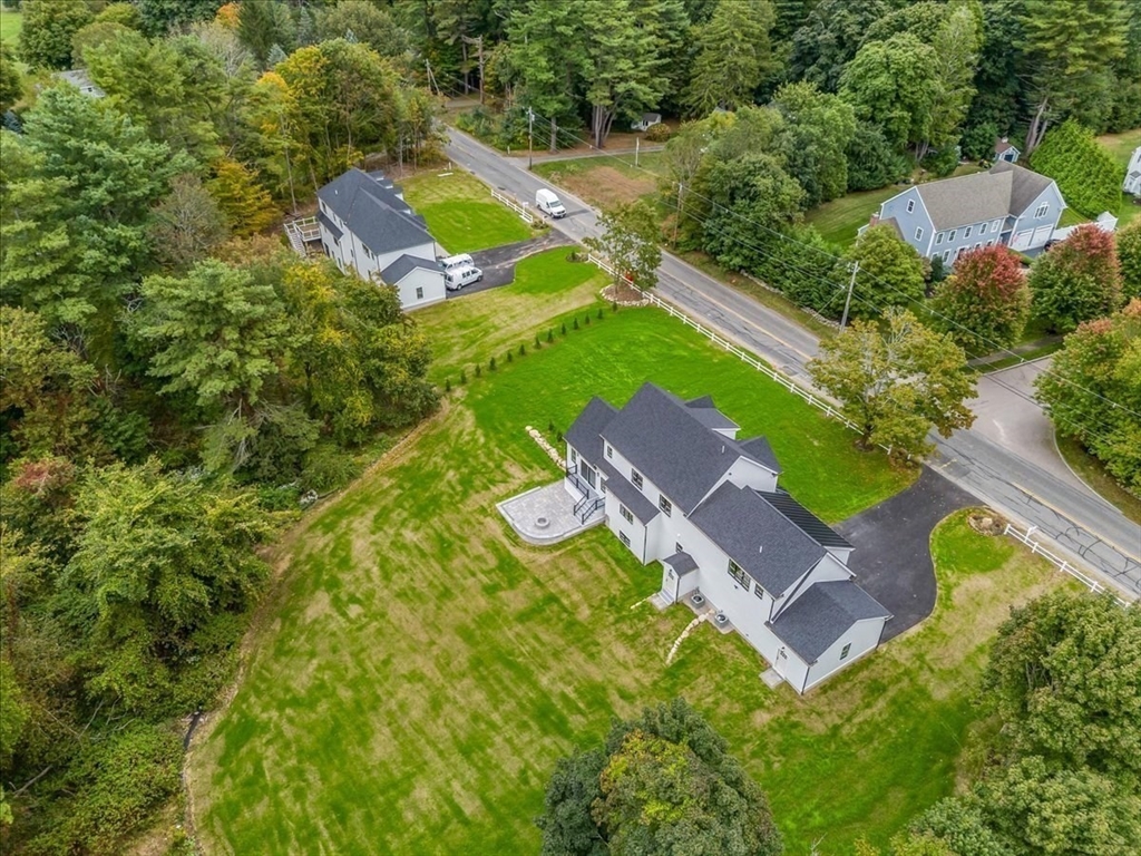 103 Center Street Hanover, MA 02339 - Photo 6 of 42 an aerial view of a house with swimming pool and garden
