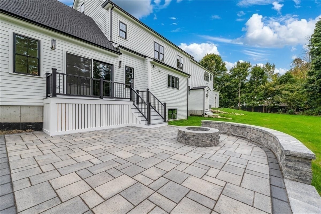 103 Center Street Hanover, MA 02339 - Photo 7 of 42 a view of a house with backyard and garden
