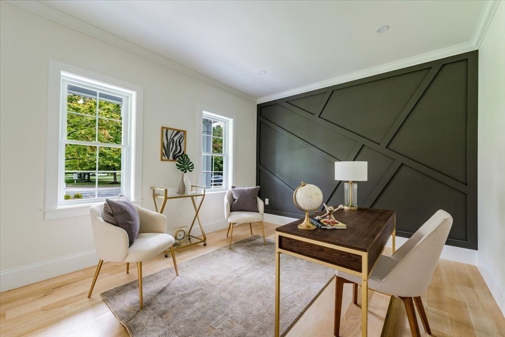 103 Center Street Hanover, MA 02339 - Photo 9 of 42 a living room with furniture and a window