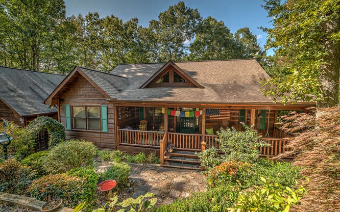 a house view with a garden space