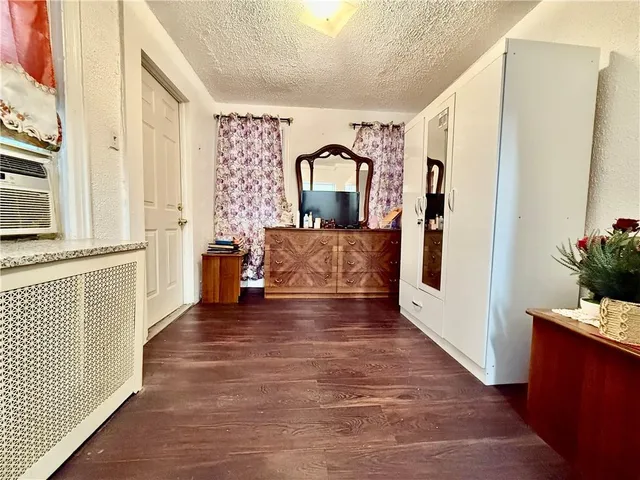 a view of living room with furniture and window