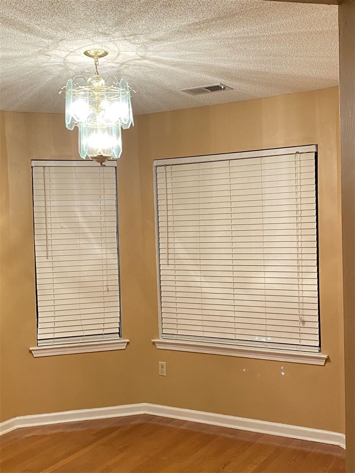 6857 Finch Road Memphis, TN 38141 - Photo 22 of 23 a view of a livingroom with a chandelier