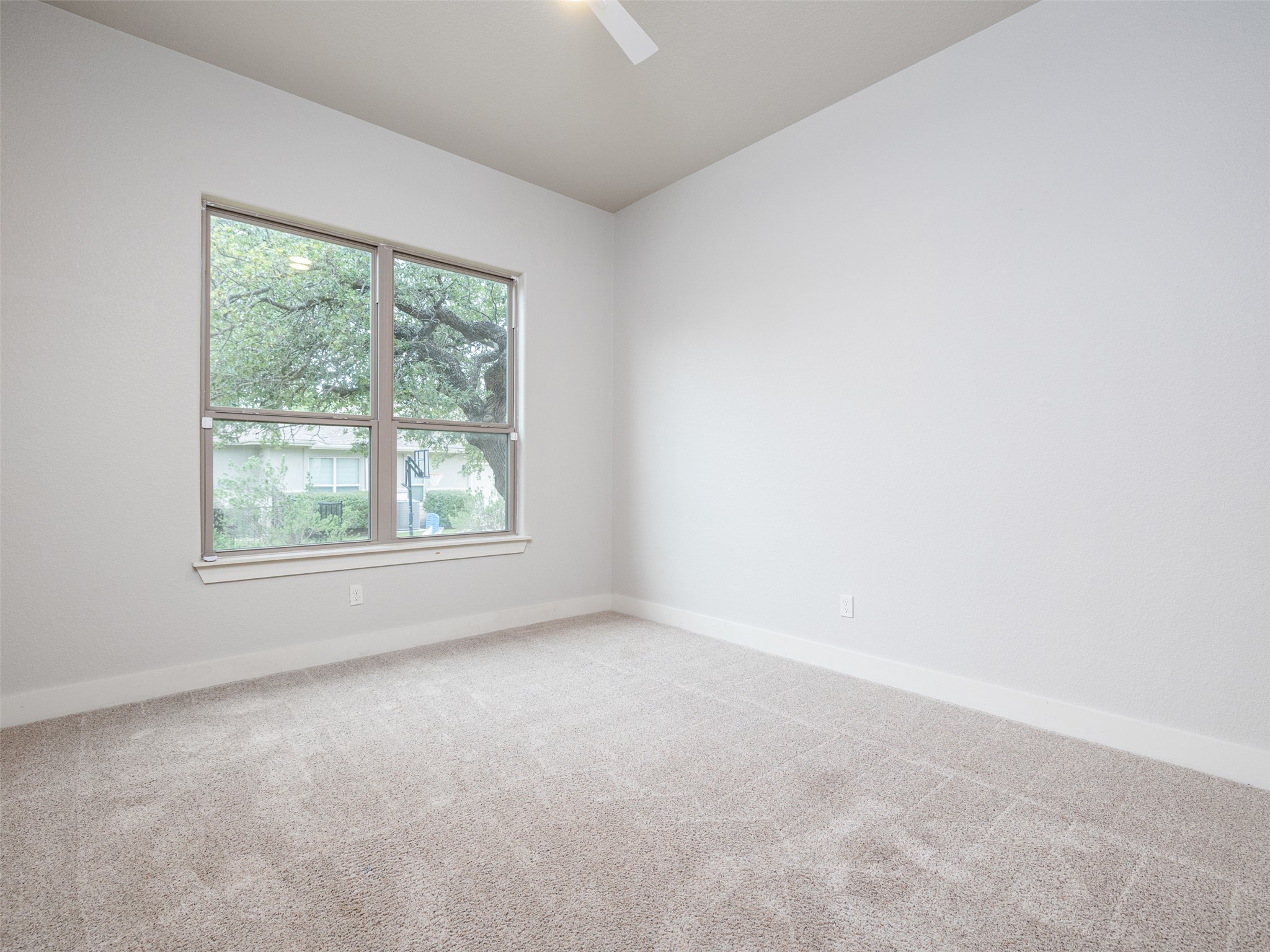 101 Aldea Street Georgetown, TX 78633 - Photo 21 of 40 This is the 3rd of the secondary bedrooms, which is situated on a hallway along with a full bathroom next door.