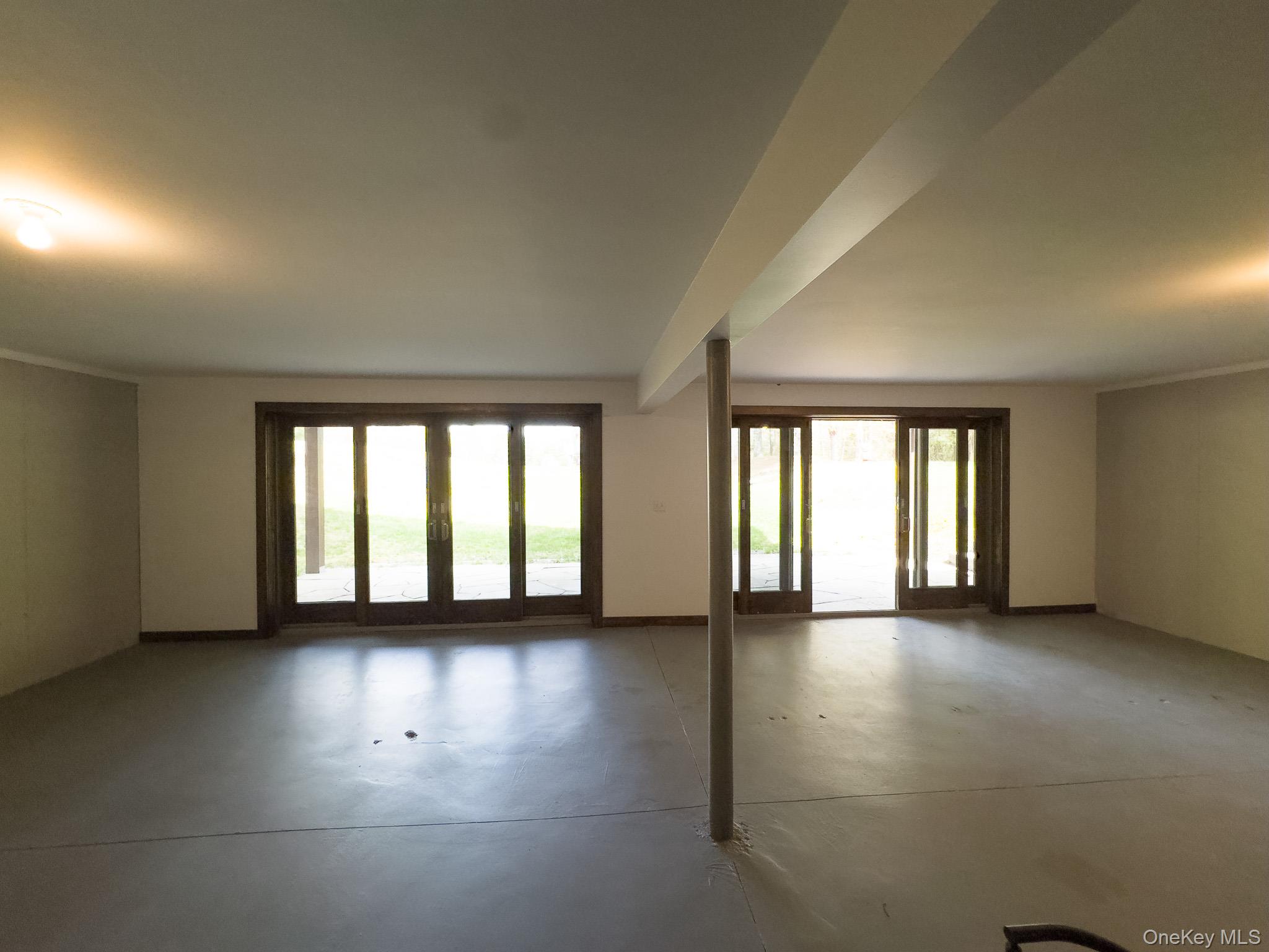 58 Deer Meadow Road White Lake, NY 12786 - Photo 33 of 41 Unfinished lower area, healthy amount of natural light. Many possibilities - Family, recreation, gym or Media room!