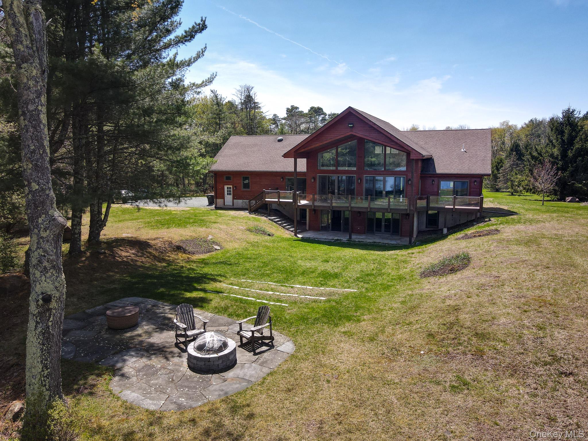 58 Deer Meadow Road White Lake, NY 12786 - Photo 6 of 41 Back of property with a lawn, a patio area, stairs, and a wooden deck