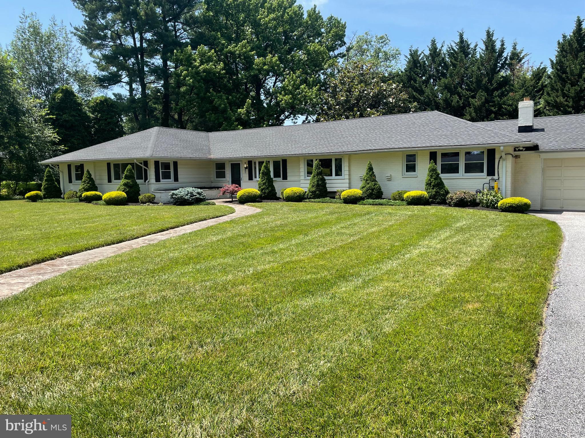 402 Ivy Church Road Lutherville-Timonium, MD 21093 - Photo 13 of 63 a front view of a house with garden