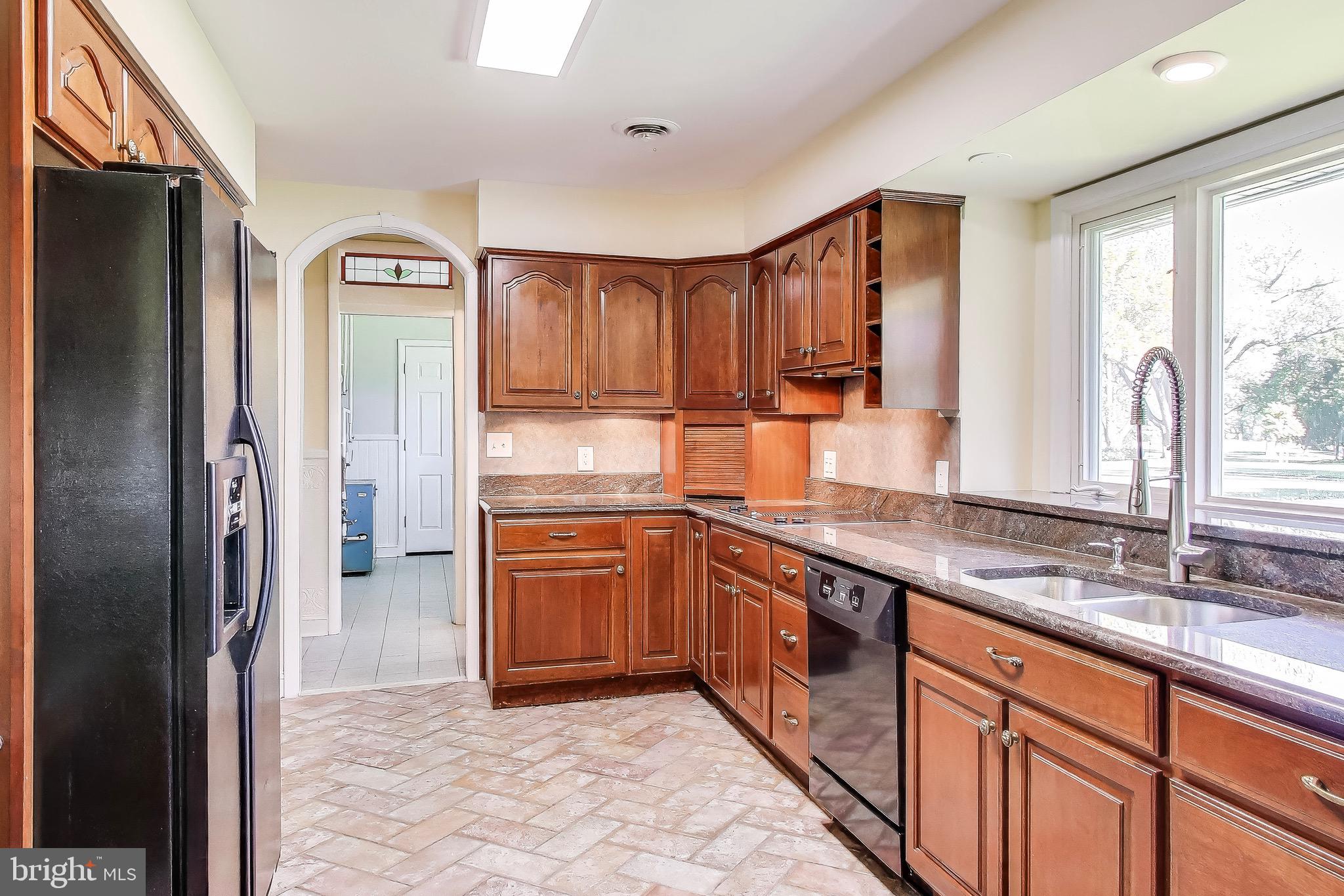402 Ivy Church Road Lutherville-Timonium, MD 21093 - Photo 30 of 63 a kitchen with stainless steel appliances granite countertop a refrigerator and a sink