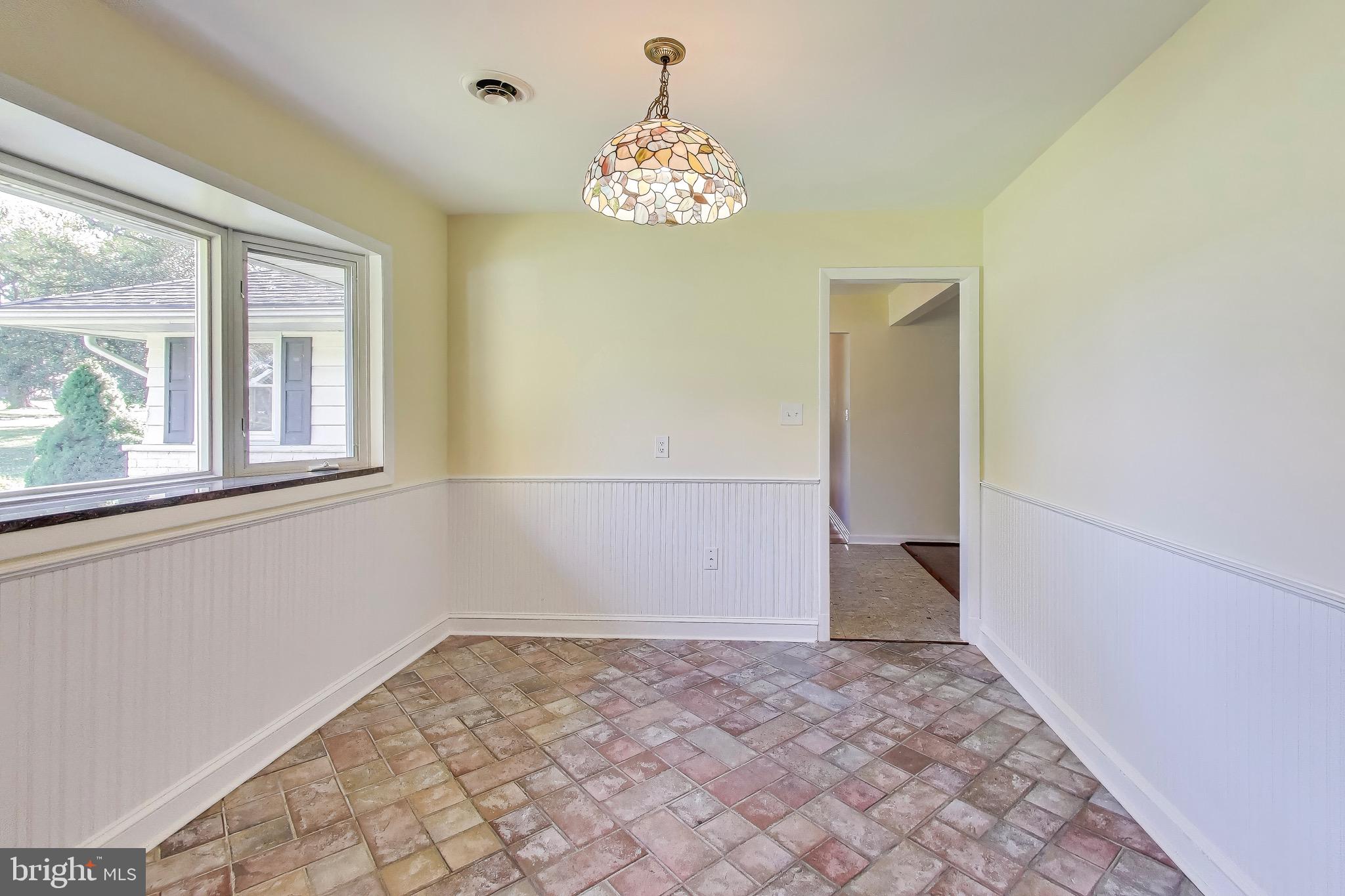 402 Ivy Church Road Lutherville-Timonium, MD 21093 - Photo 33 of 63 wooden floor in an empty room with a window
