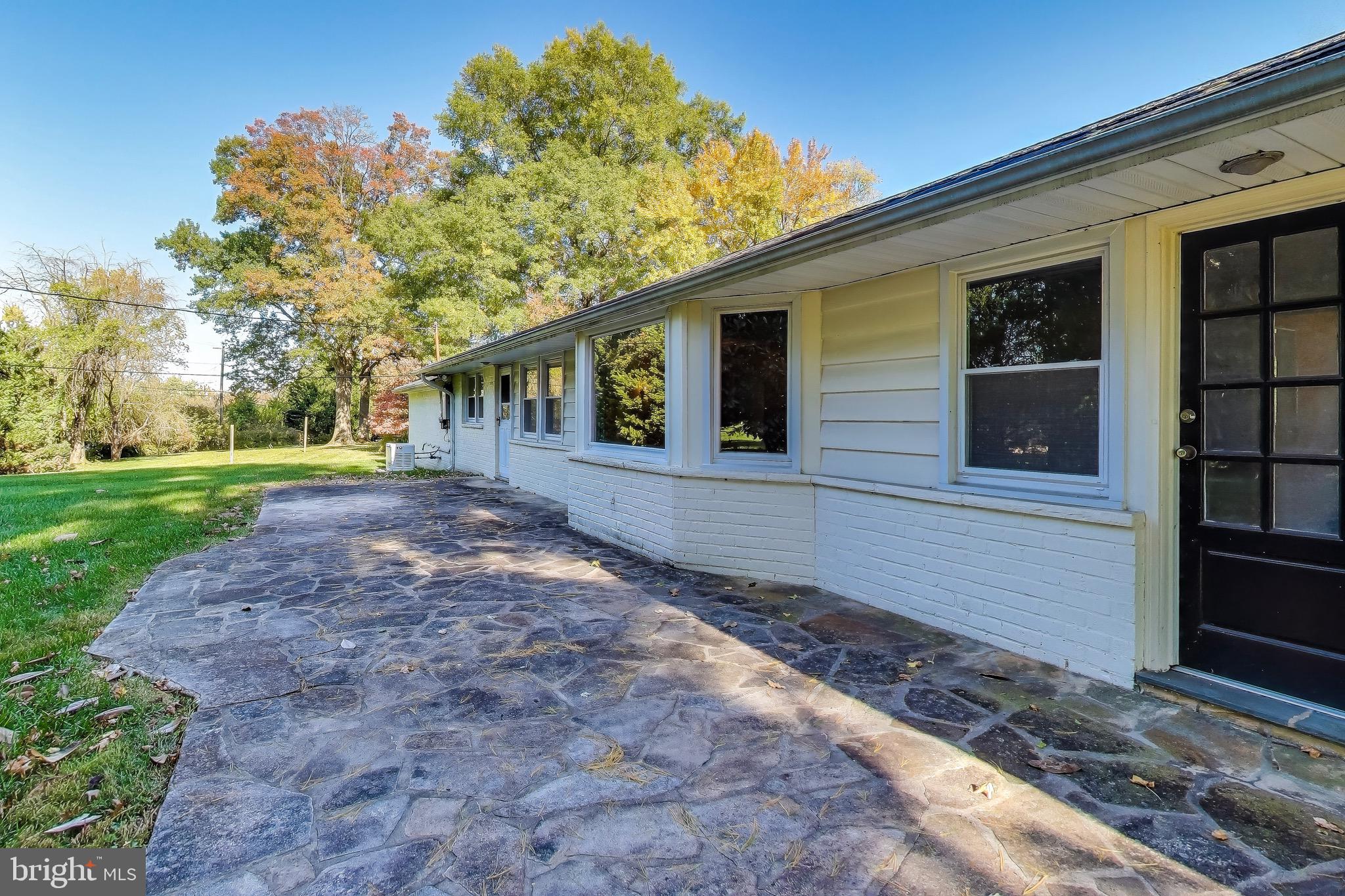 402 Ivy Church Road Lutherville-Timonium, MD 21093 - Photo 55 of 63 a front view of a house with garden