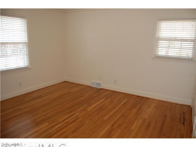 691 Chester Road Winston-Salem, NC 27104 - Photo 11 of 16 2nd Bedroom. Bedroom with refinished hardwood flooring.