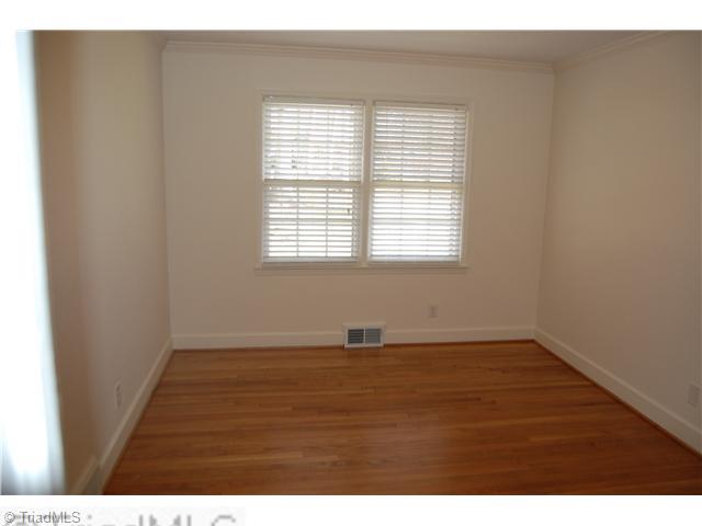 691 Chester Road Winston-Salem, NC 27104 - Photo 13 of 16 3rd Bedroom. Bedroom with refinished flooring.