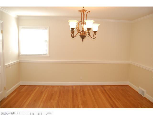 691 Chester Road Winston-Salem, NC 27104 - Photo 4 of 16 Dining Room. Dining room with refinished hardwood flooring.