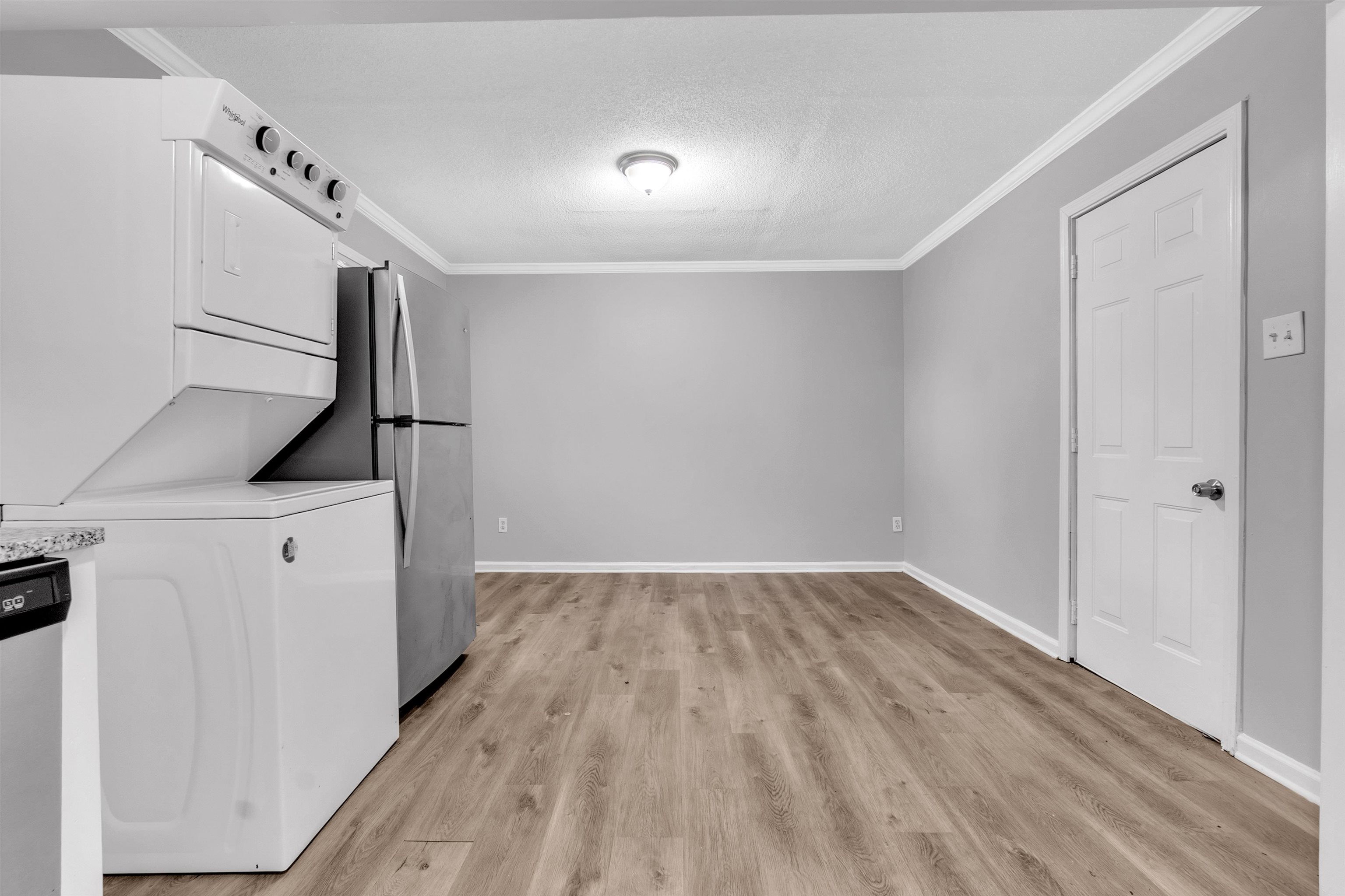 1136 South White Station Road Memphis, TN 38117 - Photo 11 of 19 a view of hallway with stairs and wooden floor