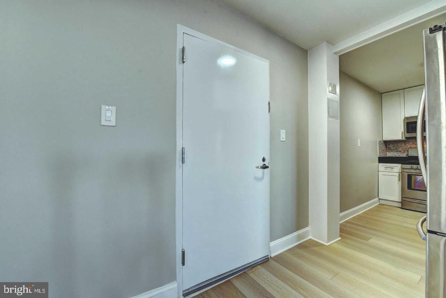 801 North Pitt Street, Unit 1206 Alexandria, VA 22314 - Photo 11 of 37 a view of a room with wooden floor