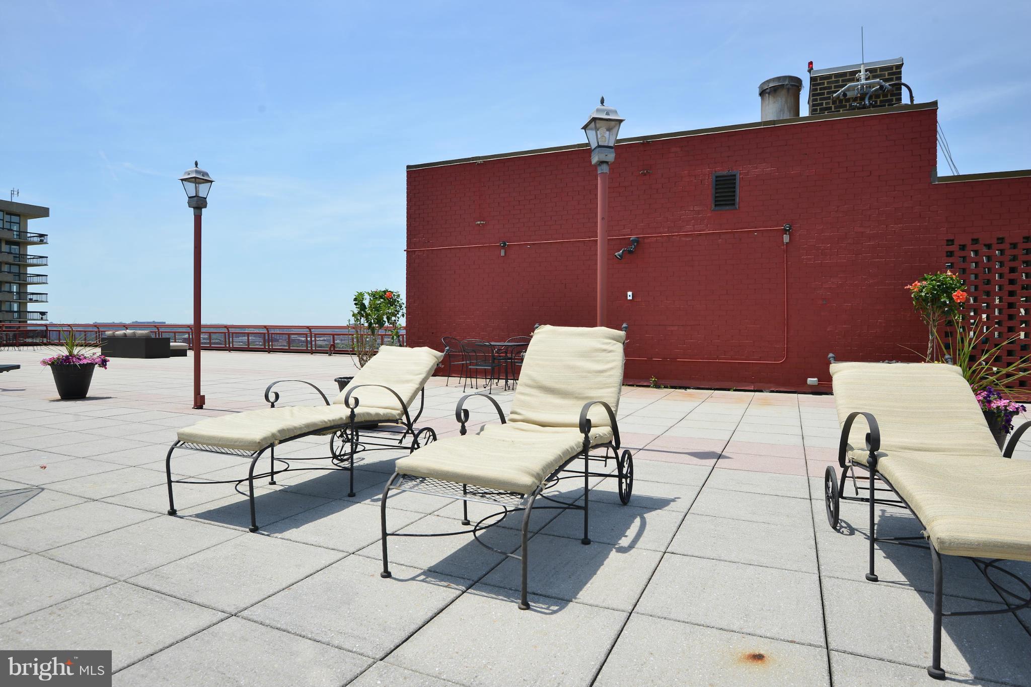 801 North Pitt Street, Unit 1206 Alexandria, VA 22314 - Photo 27 of 37 a outdoor space with a couch