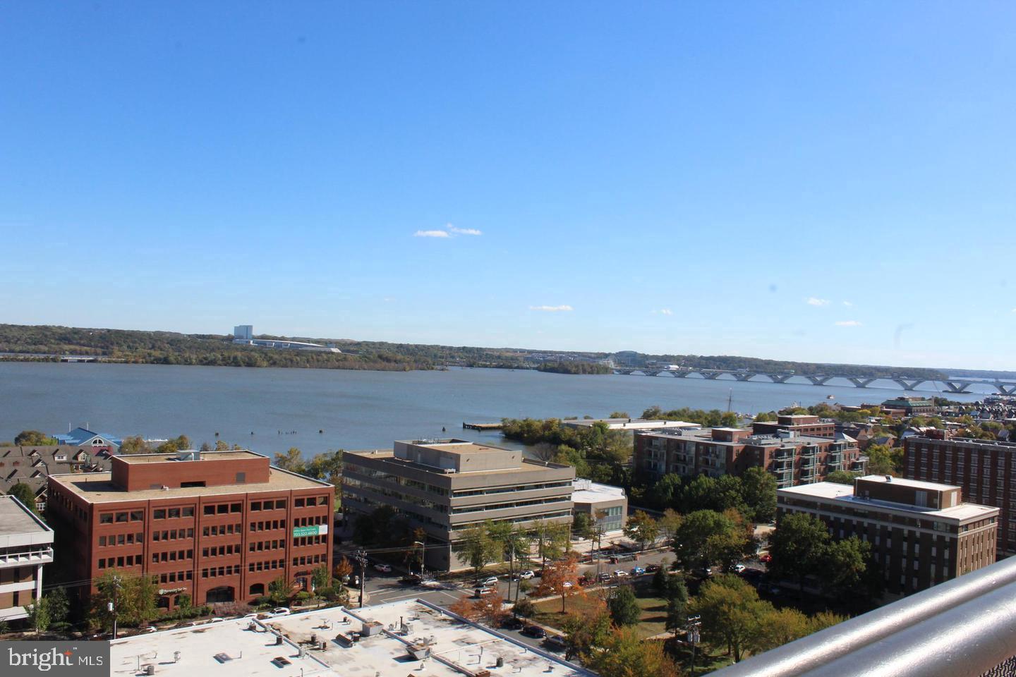 801 North Pitt Street, Unit 1206 Alexandria, VA 22314 - Photo 4 of 37 a view of a lake with a mountain view