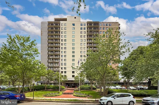 a front view of a building with street view