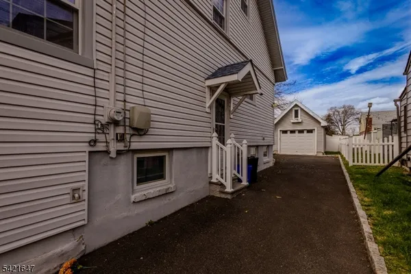 a view of a house with a street