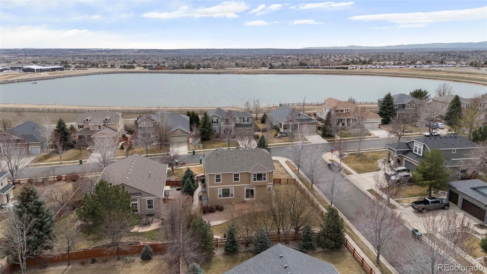 4463 Eagle River Run Broomfield, CO 80023 - Photo 37 of 44 a view of a lake with outdoor space