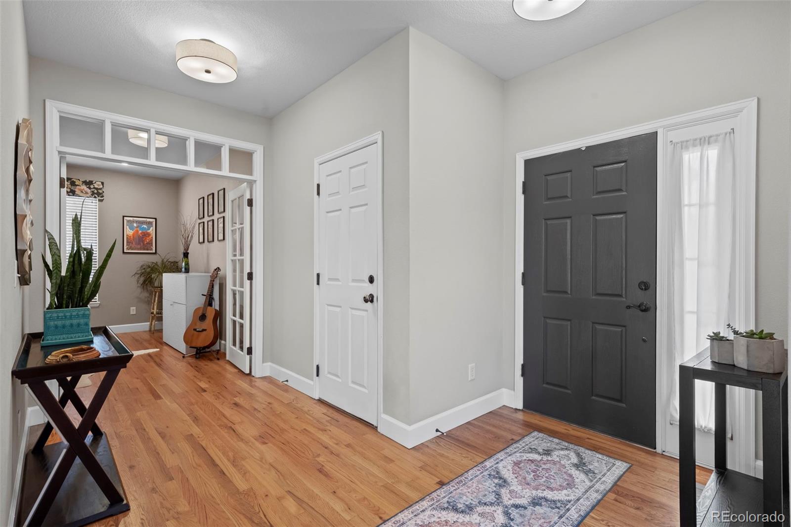 4463 Eagle River Run Broomfield, CO 80023 - Photo 4 of 44 a view of a room with gym equipment