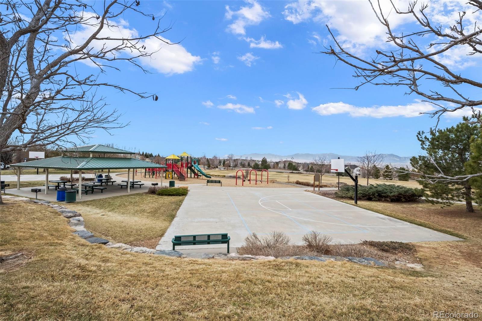 4463 Eagle River Run Broomfield, CO 80023 - Photo 42 of 44 a view of a swimming pool with an outdoor seating