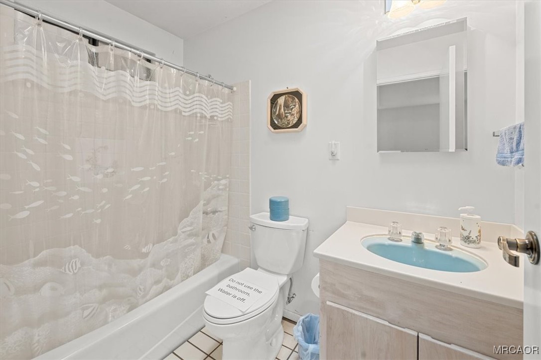 148 Crystal Lake Road Big Bear Lake, CA 92315 - Photo 23 of 29 a bathroom with a sink toilet and shower