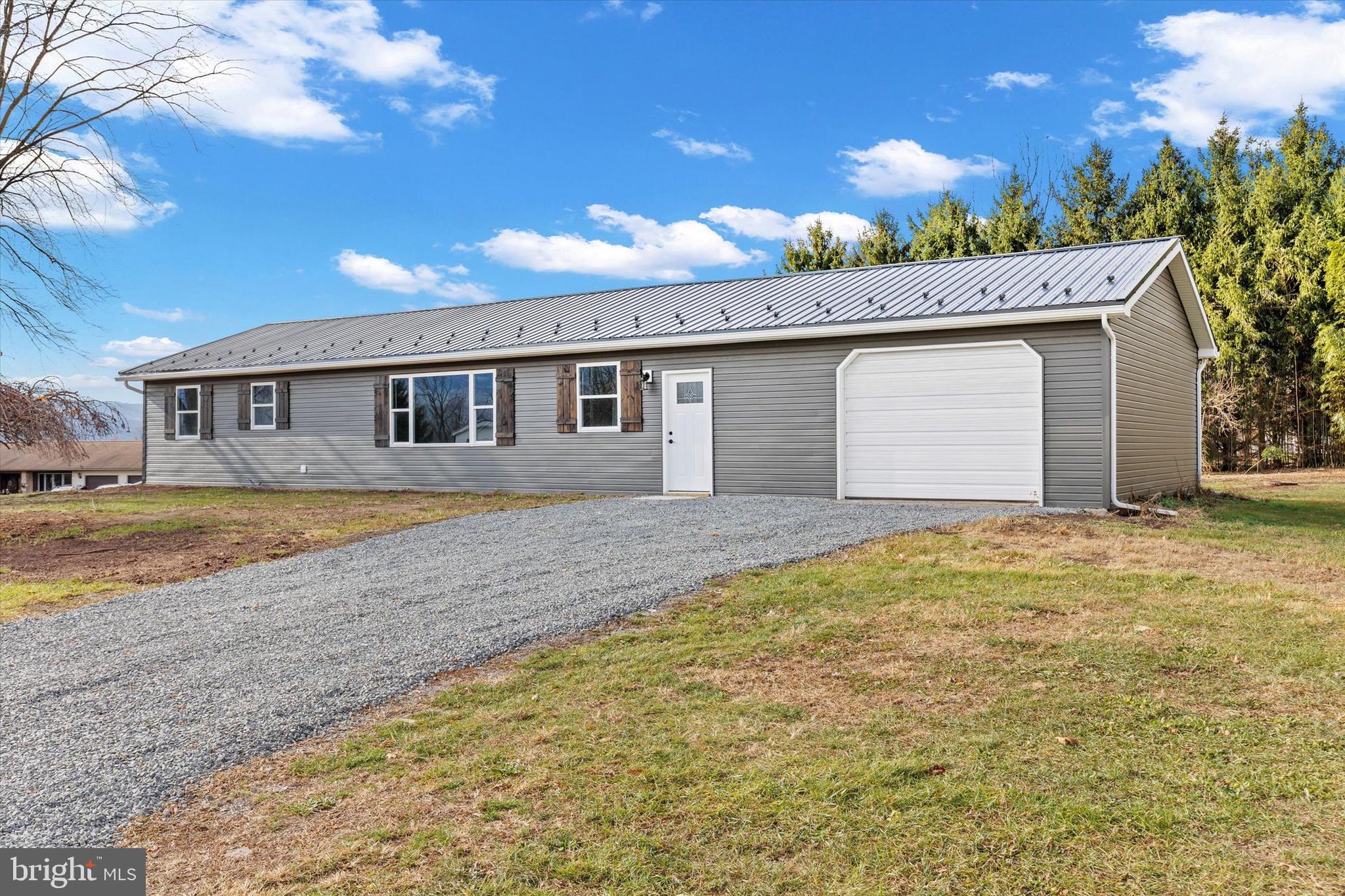 1228 Matamoras Road Halifax, PA 17032 - Photo 3 of 45 a view of house with outdoor space and swimming pool