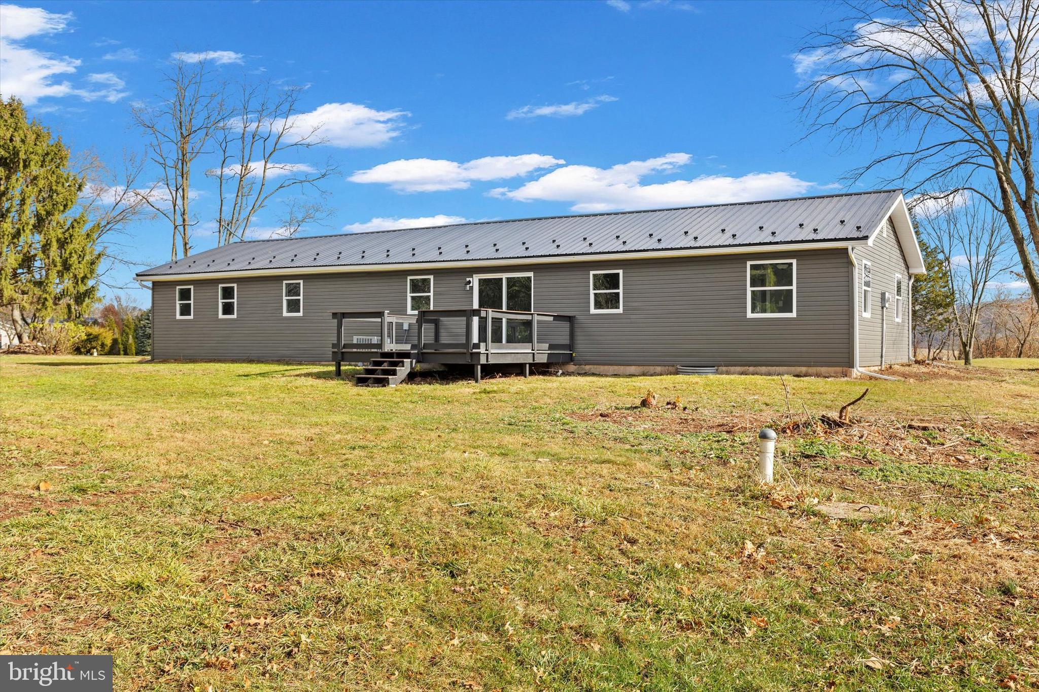 1228 Matamoras Road Halifax, PA 17032 - Photo 33 of 45 a front view of house with yard and seating area