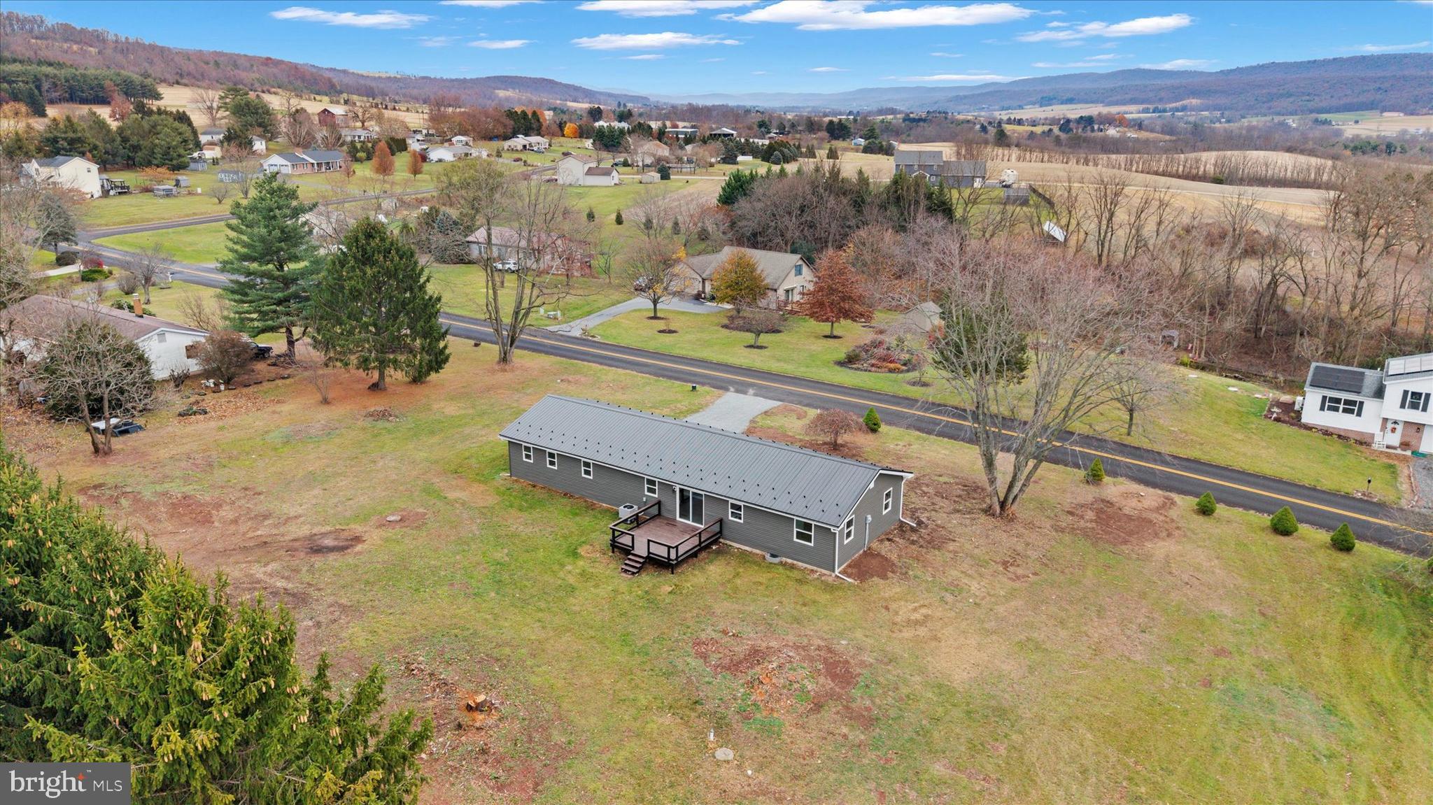 1228 Matamoras Road Halifax, PA 17032 - Photo 37 of 45 an aerial view of a house with a swimming pool