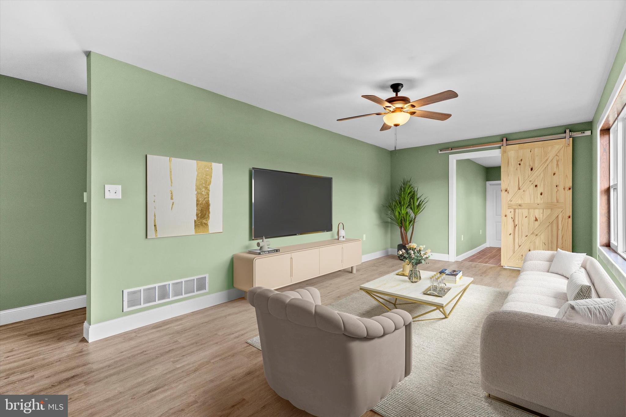 1228 Matamoras Road Halifax, PA 17032 - Photo 8 of 45 a living room with furniture potted plant and a large window